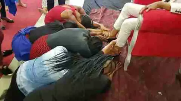 Photos Of Church Members Kneeling & Worshiping Feet & Shoes Of A Pastor Go Viral